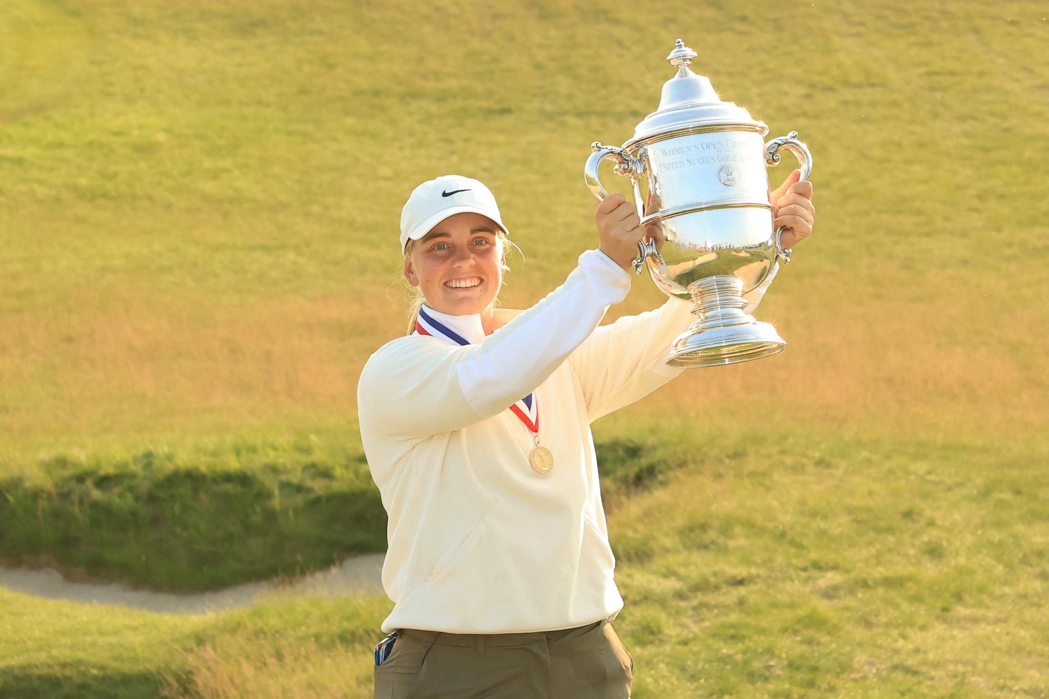 Maja Stark lifts the Harton S. Semple Trophy after winning the final round of the U.S. Women's Open.