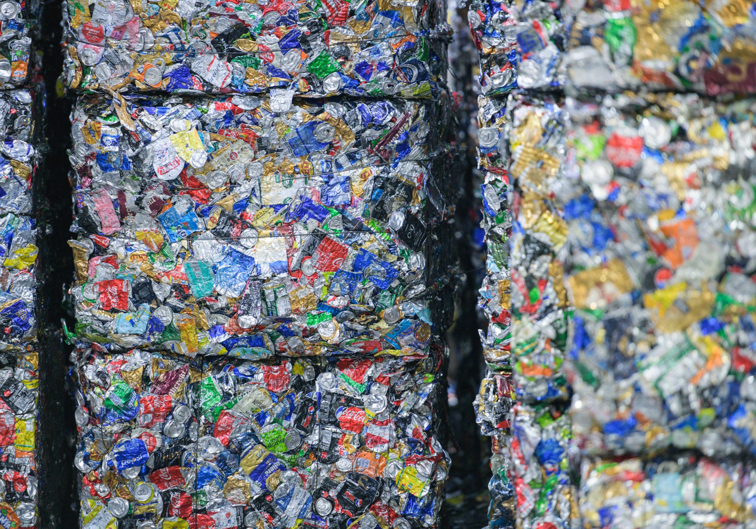 Drink cans pressed together for recycling.