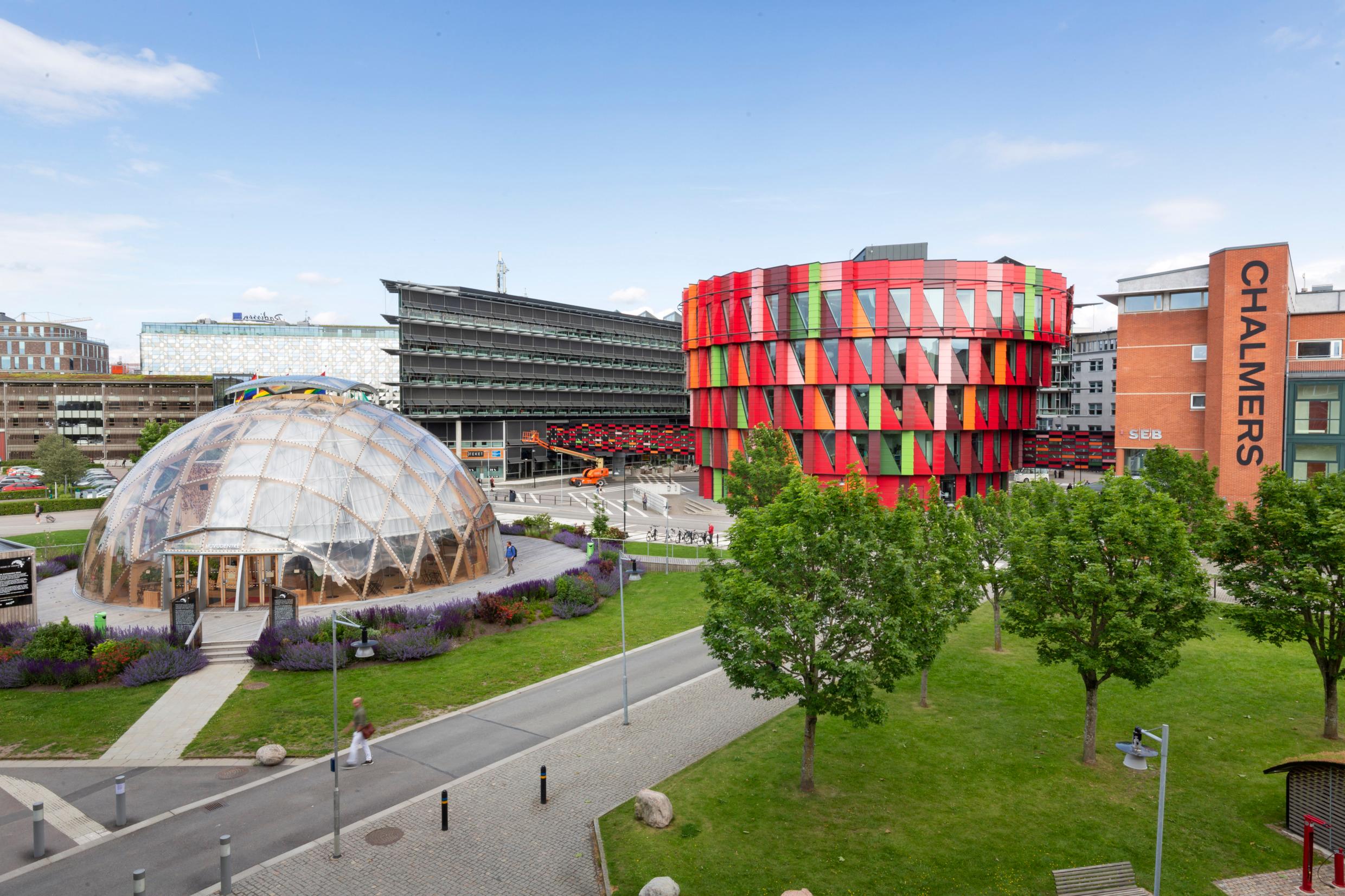 A park-like area with buildings in various shapes.