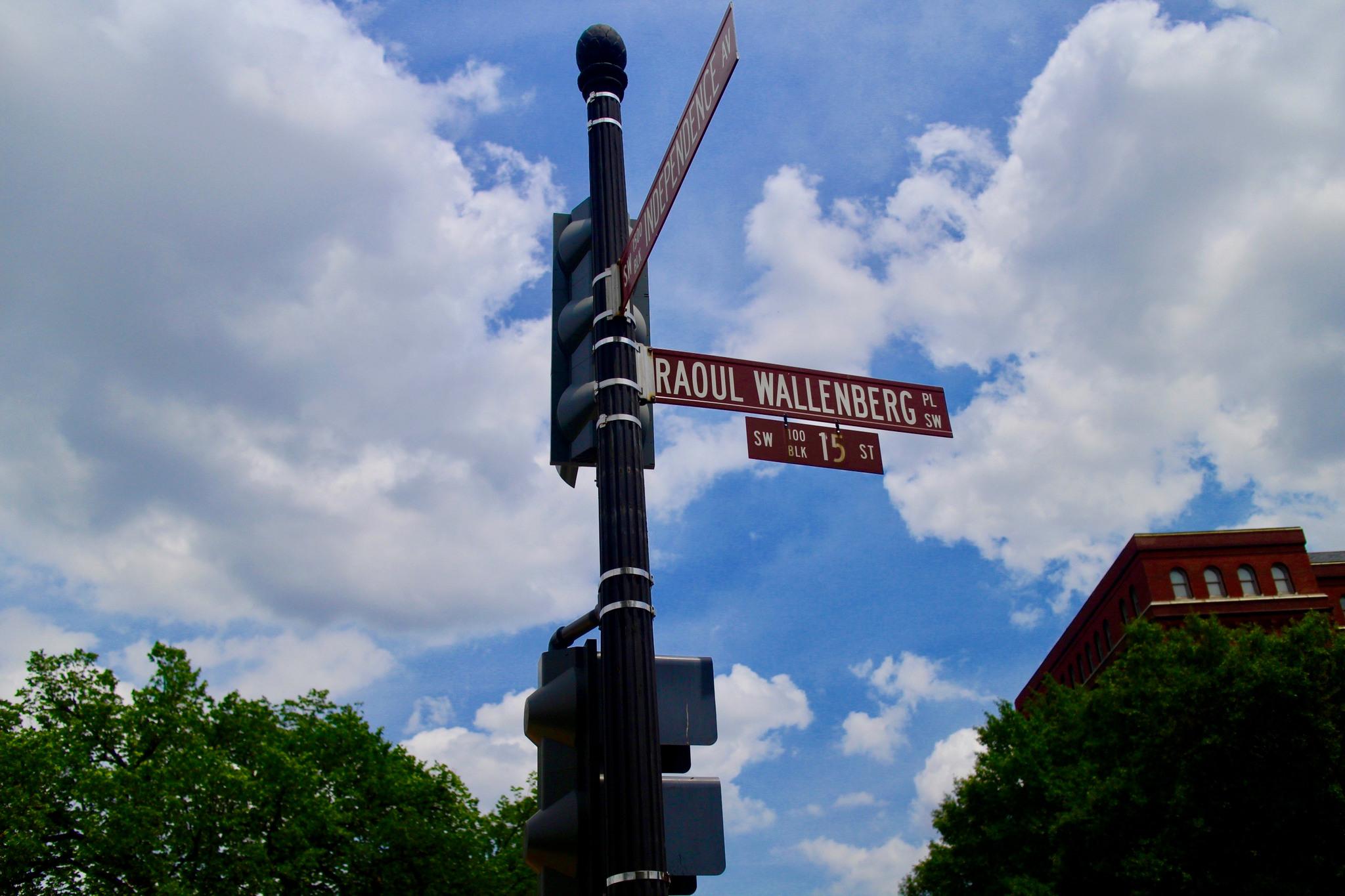 A streetsign reading &quot;Raoul Wallenberg Pl.&quot;.